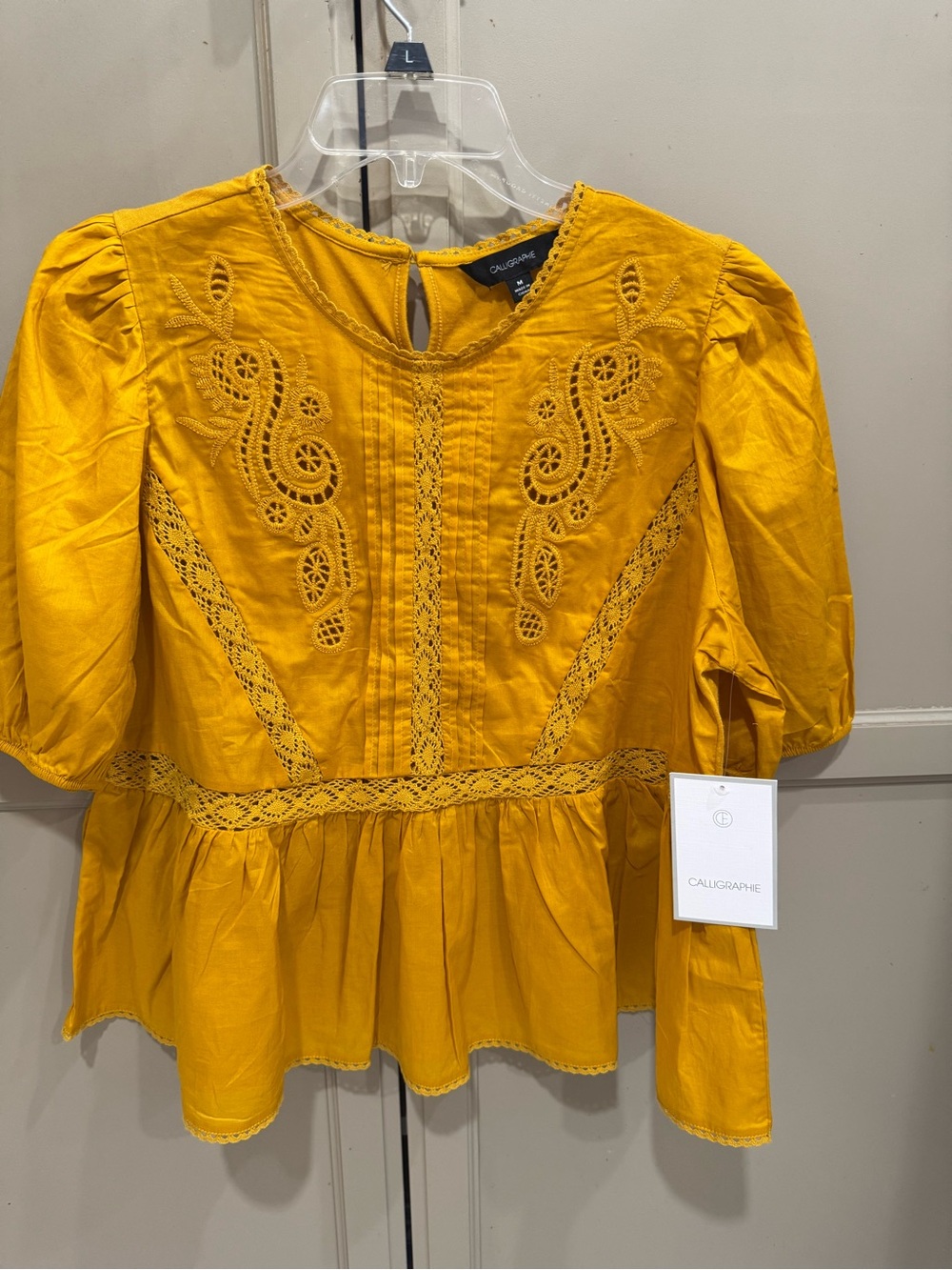 Calli & Co. Embroidered Mustard Yellow Peplum Blouse